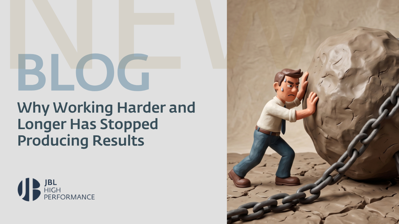 A stressed man in business attire struggles to push a large chained boulder uphill, illustrating the futility of working harder without progress.